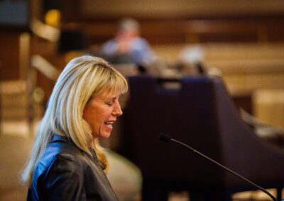 Woman giving a speech at The Common Ground of Energy Transformation event