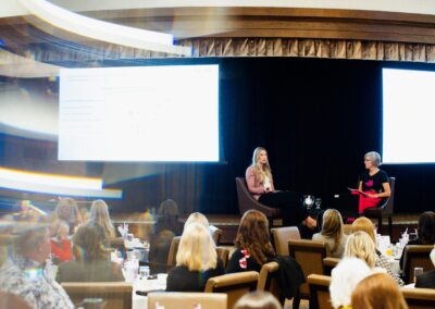 Two women giving a presentation at The Common Ground of Energy Transformation event