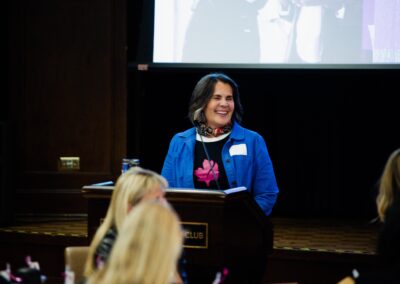 Laughing woman giving a speech during The Common Ground of Energy Transformation event